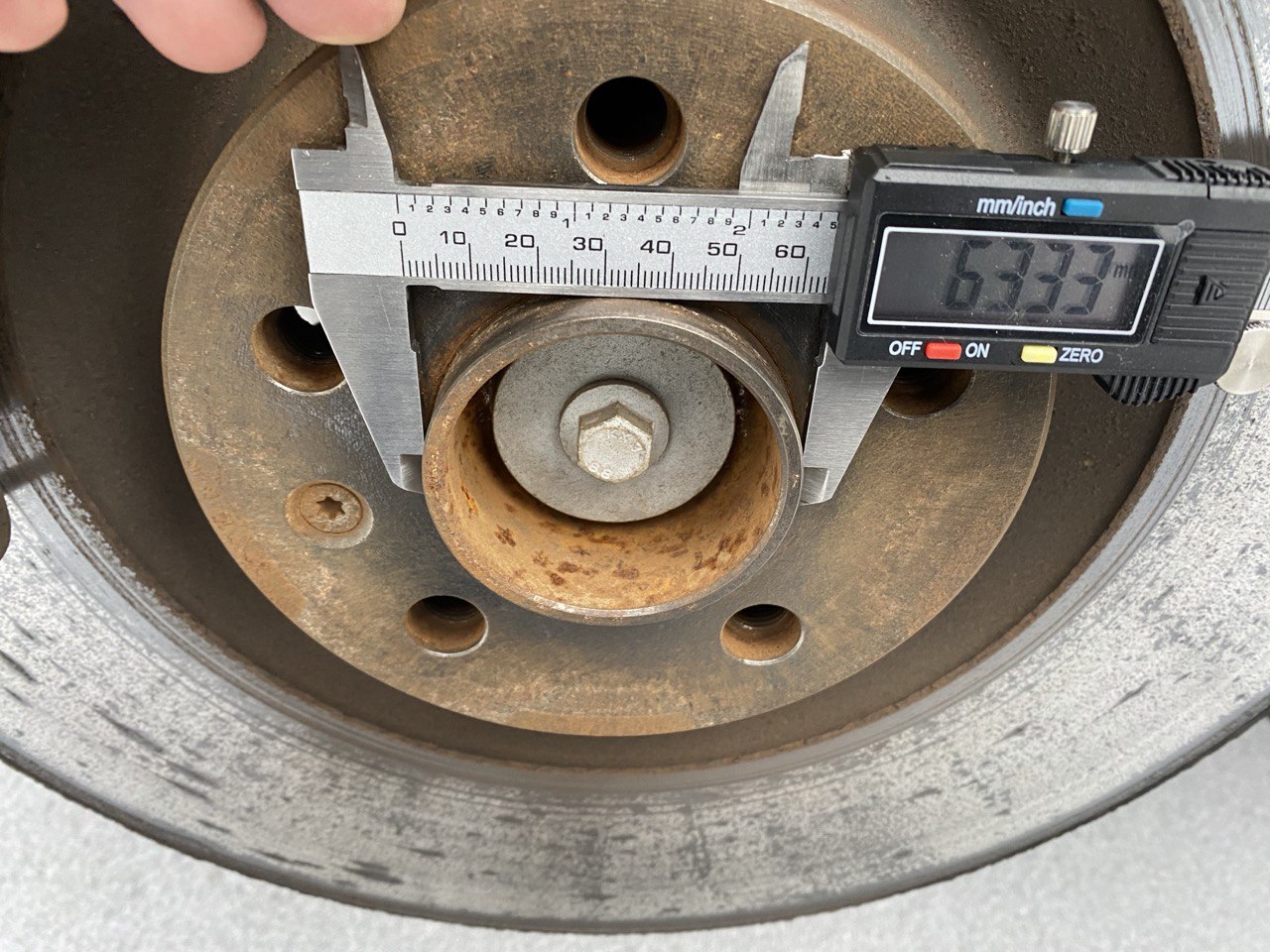Measuring car hub diameter with calipers